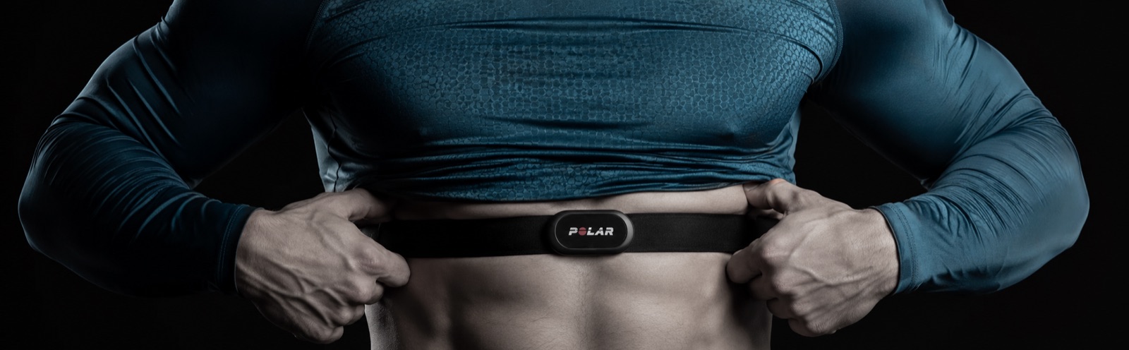 Polar H10 chest strap worn on the torso — electrical, ECG-grade RR measurement